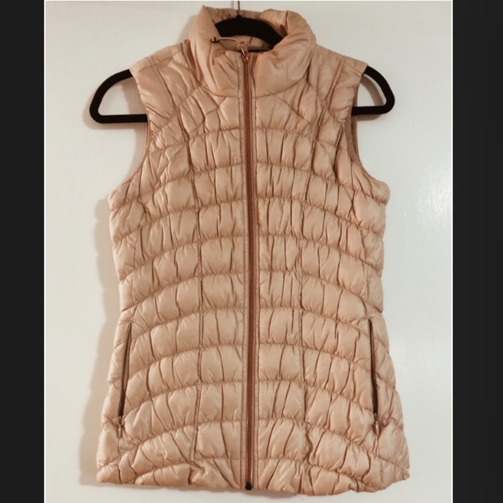 Light pink Athleta vest.